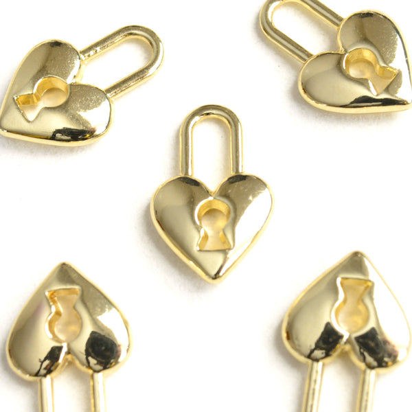 gold toned heart shaped padlock charms