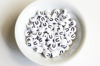 Letter U Plastic Alphabet Beads, White With Black Initial, 7mm x 3.5mm - 100 pieces (BTU)