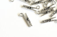 Tiny Clothespin Charms, Silver Tone Clothing Pins, 19mm x 7mm - 10 pie –  Paper Dog Supply Co